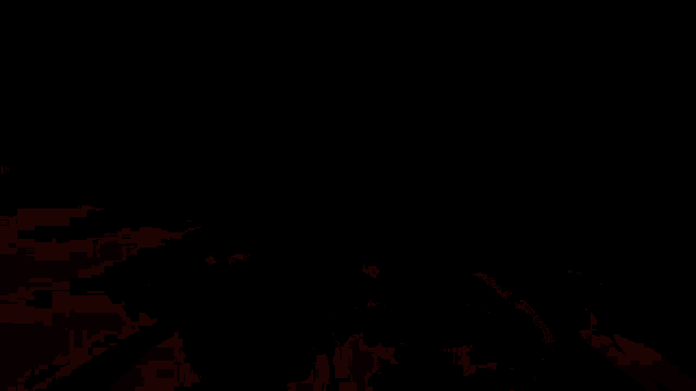 a person is holding a gun in a video game at night