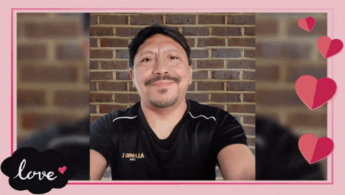 a man wearing a black shirt with the word tortilla on the front