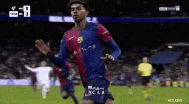 a soccer player wearing a jersey that says xclo is running on the field