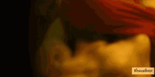a blurred image of a person with the word honestoo on the bottom