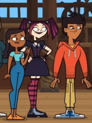 a group of cartoon characters standing next to each other .