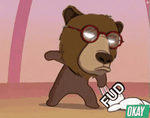 a cartoon bear wearing glasses and holding a piece of paper with fud written on it