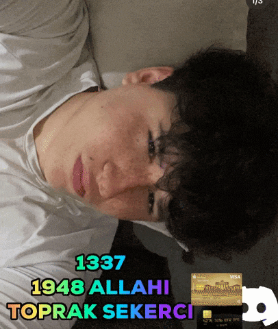 a young man laying on a couch with 1337 1948 allahi toprak sekerci written above him