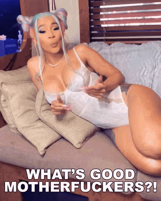 a woman laying on a couch with the words " what 's good motherfuckers " on the bottom
