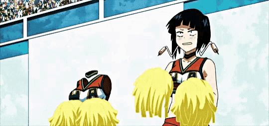 a girl in a cheerleading uniform is standing next to a boy with yellow pom poms .