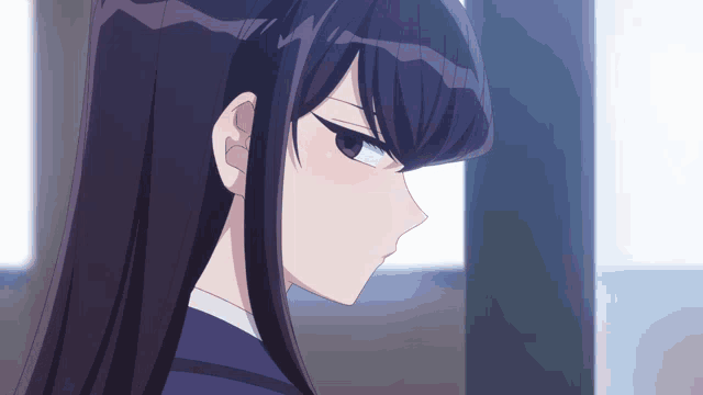 a close up of a person 's face with purple hair
