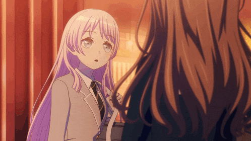 a girl with long white hair is standing next to another girl