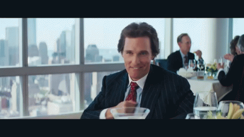 The Wolf Of Wall Street Dances To The Beat Of Mcconaughey'S Drum. GIF - Movies Wolf Of GIFs