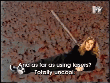 a man laying on the ground with the words " and as far as using lasers "