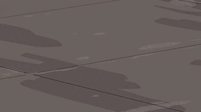 a cartoon character with blonde hair and a beard is laying on the ground