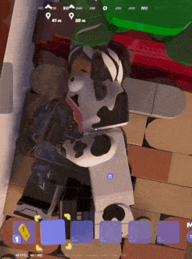 a screenshot of a video game shows a cow laying on a brick floor