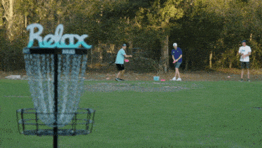 a frisbee is being thrown into a basket that says prize on it