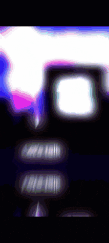 a blurry image of a purple and blue background with a square in the middle