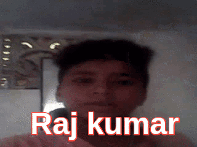 a close up of a person with the name raj kumar on it