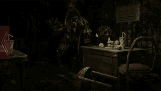 a close up of a bloody skull with glowing eyes in a dark room