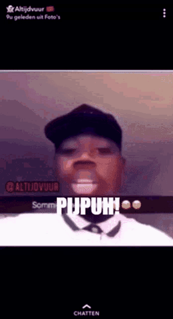 a man wearing a hat is making a funny face and says pupuh ..