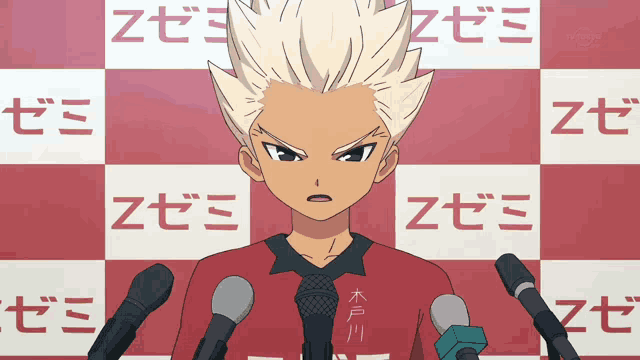 a cartoon character stands in front of microphones in front of a red and white checkered background with the letters z on it