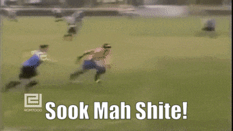 a soccer game is being played with the words " sook mah shite " on the bottom right