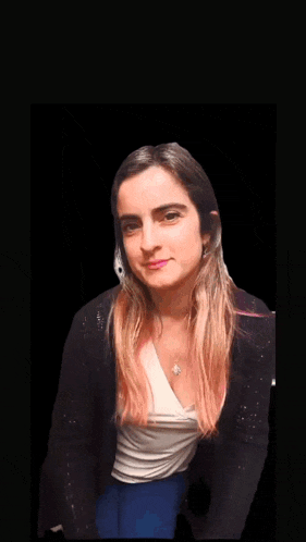 a woman 's face is surrounded by stars and the word quiero is on the bottom