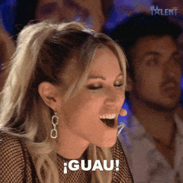 a woman with a ponytail is laughing and says " guau "