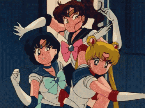 a group of sailor moon characters are posing for a photo