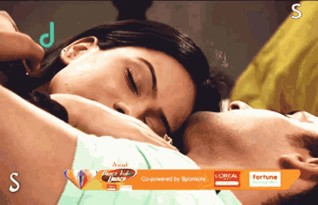 a man and a woman laying next to each other with an advertisement for fortune on the bottom