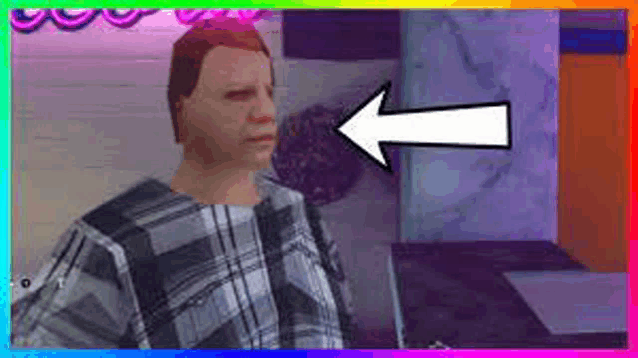 a man in a plaid shirt is standing in front of a purple wall with an arrow pointing to the left .