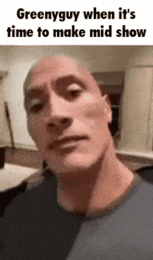 a close up of a man 's face with the words greenyguy when it 's time to make mid show