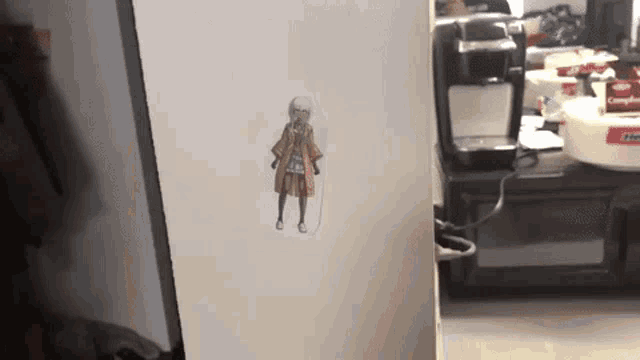 a drawing of a girl is on a white board