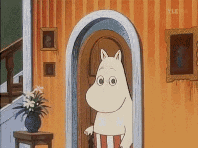 a cartoon character standing in front of a door with yle written on the bottom