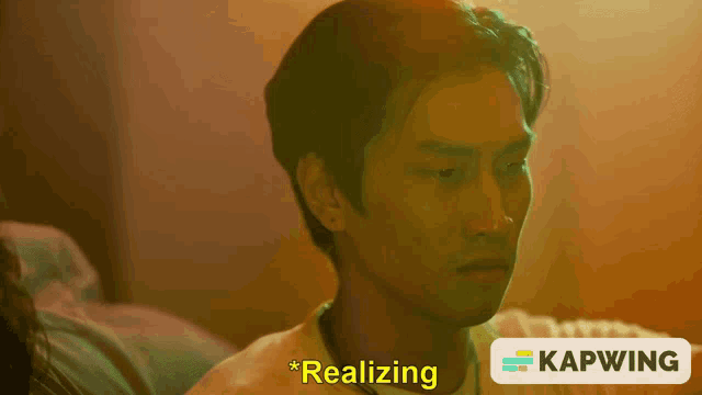 a man 's face is shown with the word realizing next to him