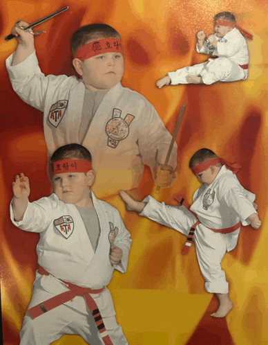 a young boy in a karate uniform with a red headband with korean writing on it