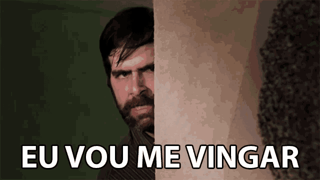 a man with a beard is peeking out from behind a wall with the words eu vou me vingar below him