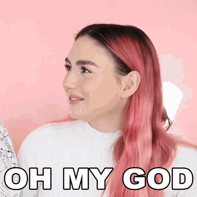 a woman with pink hair has the words oh my god written on her face