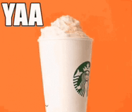 a starbucks cup with whipped cream on top and the words yaa above it