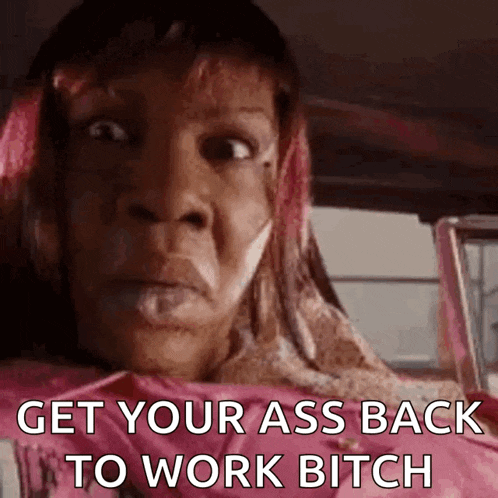 a woman is sitting in the back seat of a car with a pink shirt on .