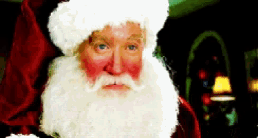 a close up of a santa claus with a red face
