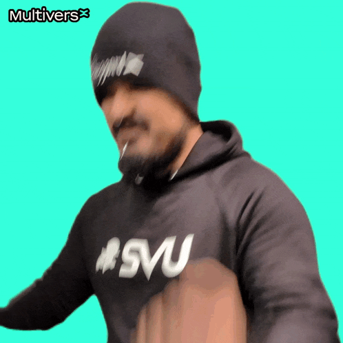 a man wearing a beanie and a hoodie that says svu