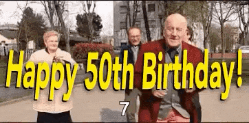 a group of people are dancing in a park with the words `` happy 50th birthday '' written above them .