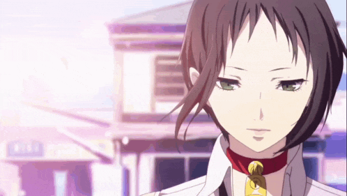 a girl with short hair and green eyes is wearing a red collar with a bell on it