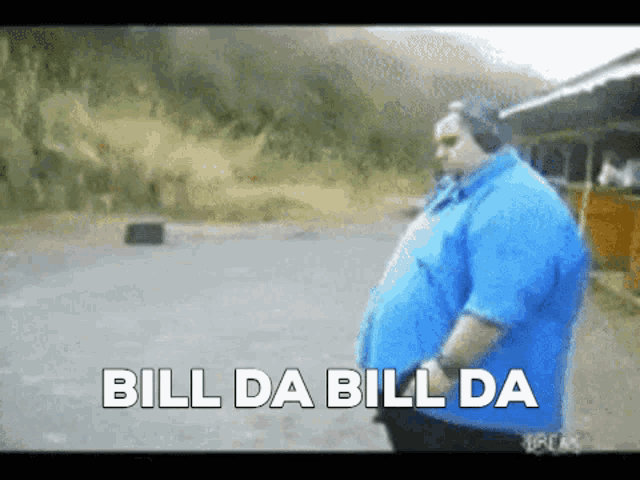 a fat man in a blue shirt says bill da bill da in white letters
