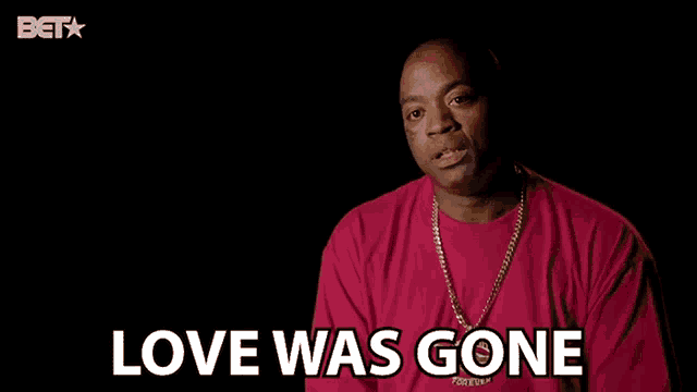 a man wearing a red shirt and a gold chain is saying `` love was gone '' .