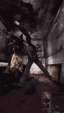 a man is being attacked by a ghost in a dark room
