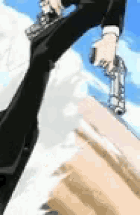a man in a suit is holding a gun while standing on a roof .