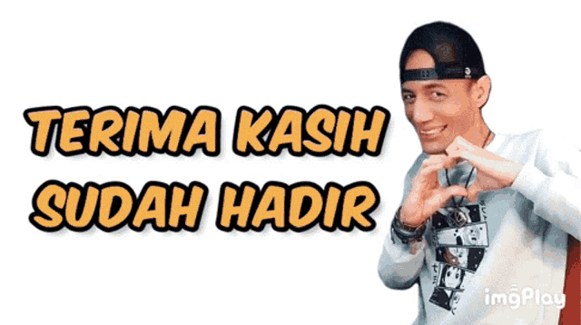a man making a heart shape with his hands and the words terima kasih sudah hadir behind him