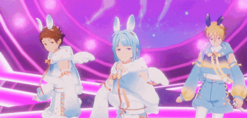 three anime characters are standing next to each other on a stage with bunny ears on their heads .