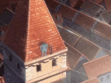 a statue of a man is standing on top of a brick building
