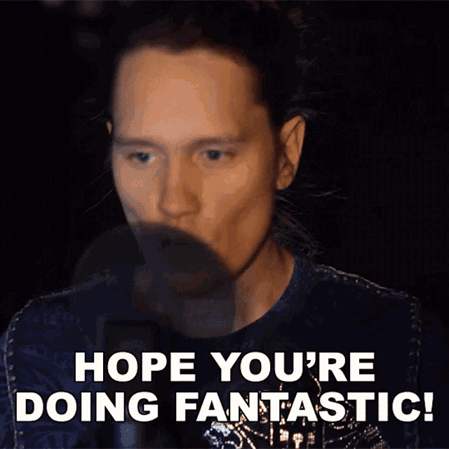 a man says " hope you 're doing fantastic " in front of a black background