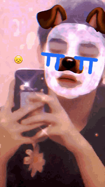 a person wearing a dog mask with a t on it