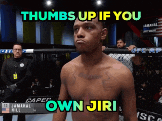 a man in a boxing ring with thumbs up if you own jiri